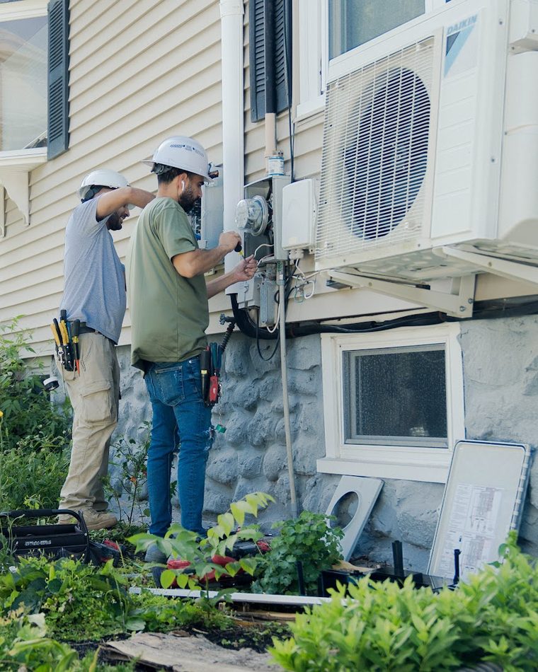 BHS technicians installing a mini-split heat pump