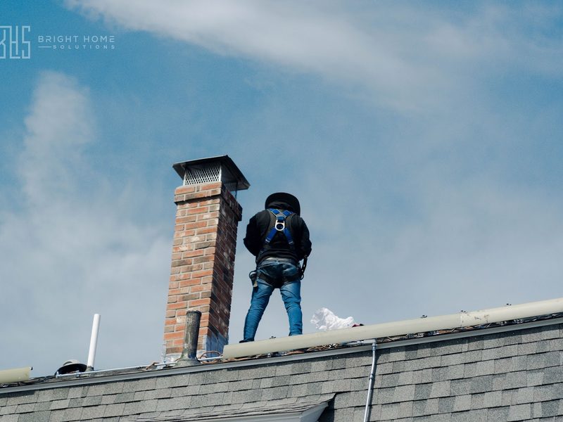 BHS crew on a roof during a solar plus roof project
